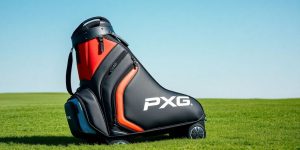 Stylish PXG golf bag on a sunny golf course.